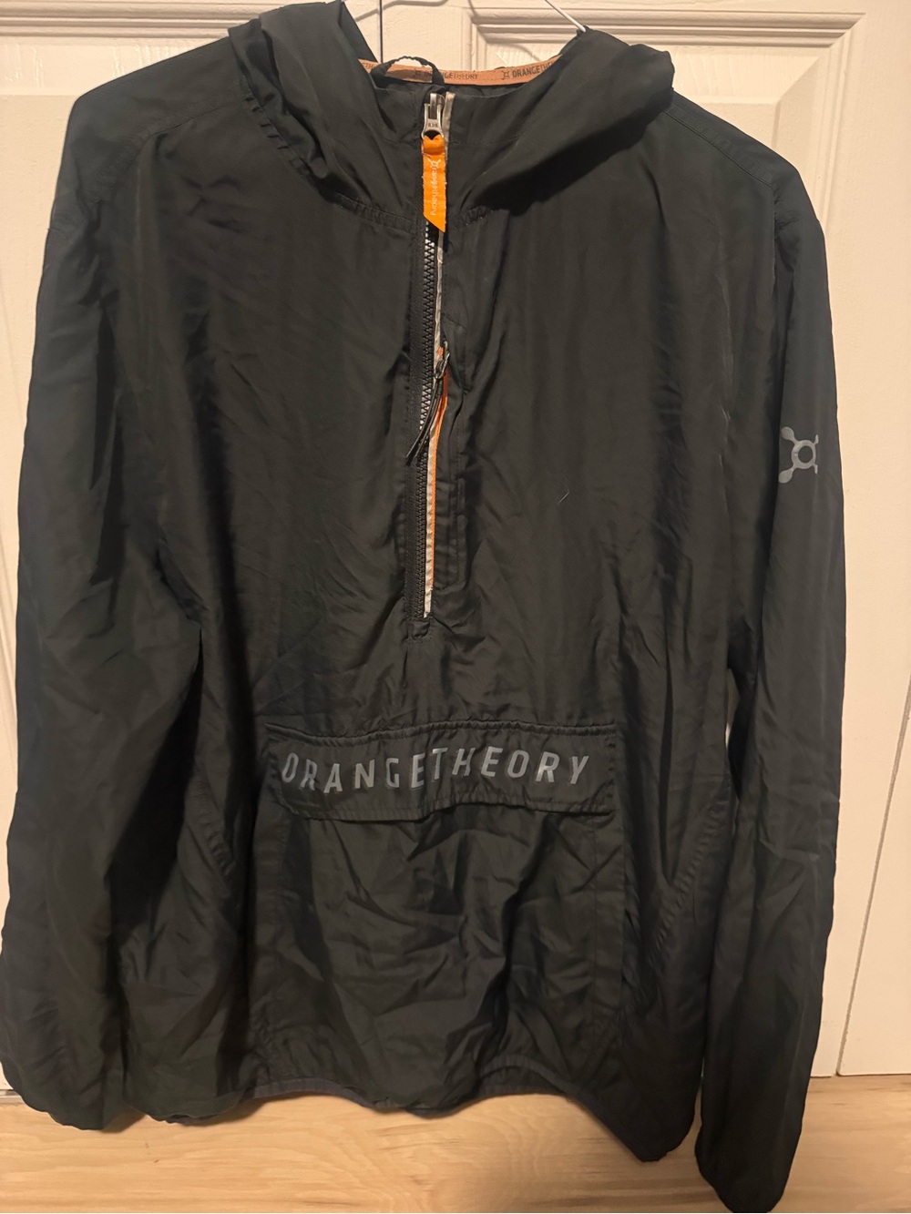 Orangetheory Black Hooded Windbreaker with Orange Zip Accent
